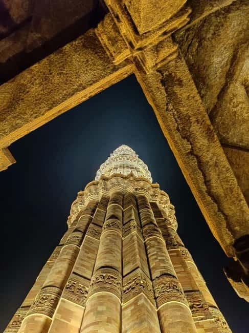 Delhi: Evening City Tour with Private Guide By Car - Qutub Minar after dark: 73 meters of UNESCO drama