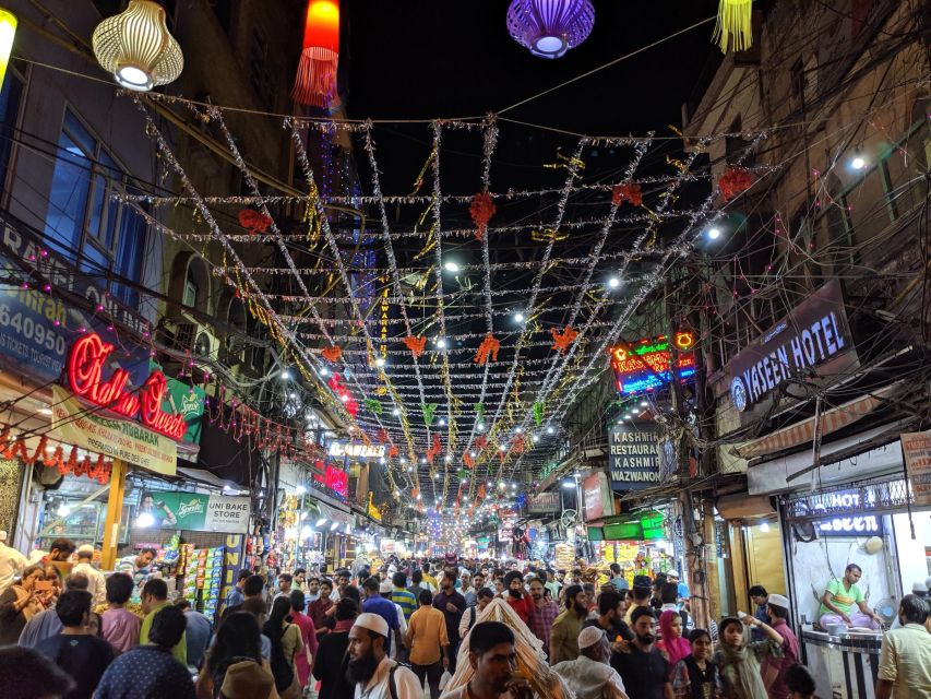 Delhi: Old Delhi Slum Tour by Metro or Car - Walking the narrow lanes: garment micro-work, street life, and real constraints