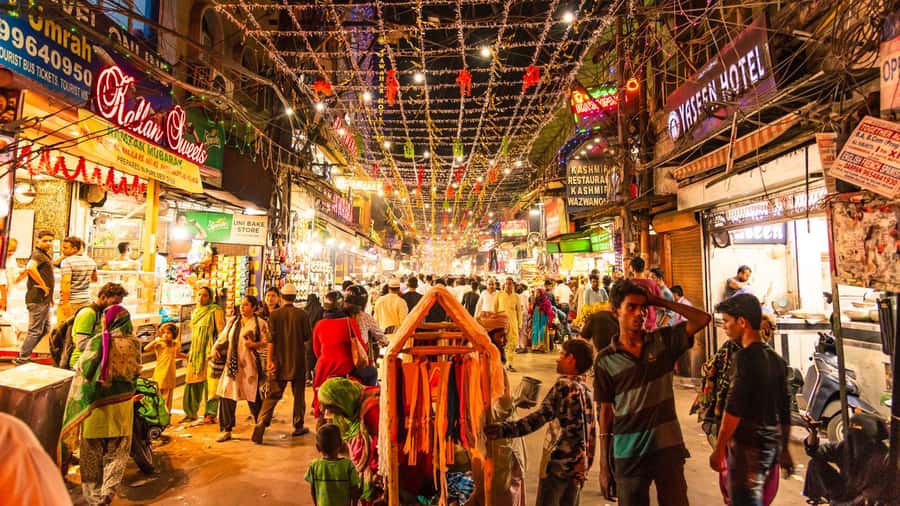 Delhi: Private Half-Day Shopping Tour with Transfer - Chandni Chowk: Textiles, Watches, and Shopping With Local Context