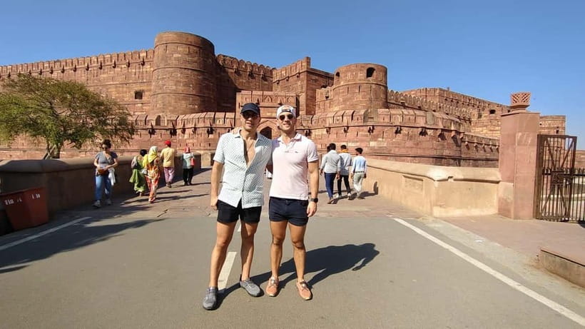 From Jaipur: Private Taj Mahal & Agra Day Trip with 5</em> Lunch – The Jaipur-to-Agra Drive: Private Comfort That Actually Matters’ /><br />
Jaipur to Agra is the kind of leg that can make or break your day. On this tour you’re in a private AC car with pickup from your hotel or any location in Jaipur, and you’re not doing the usual “find transport, haggle price, wait around” routine. The best part is consistency: you’re picked up, you’re driven, and you arrive with time to get your bearings before the big sightseeing push.</p>
<p><p>Plan for a long day in general. Even though the booking shows a wide duration range (3–12 hours), your sightseeing blocks are substantial: several hours of walking and guided time across multiple sites, plus driving. If you’re the type who likes calm mornings, this is a good fit—just remember that Agra days often start early because the Taj Mahal gets busy.</p>
</p>
<p><p>You’ll also appreciate small included items that reduce hassle in India heat and crowds: water bottles and umbrellas are provided. Those are the kinds of extras you notice when you need them, not when you’re checking off the itinerary on paper.</p>
</p>
<div style="margin: 20px 0; padding: 15px 0;"><p>You can also read our reviews of more private tours in Jaipur</p><ul style="margin: 10px 0; padding: 0; list-style: none;"><li style="margin: 0 0 10px 0; padding: 0 0 10px 0; border-bottom: 1px solid #eee; display: flex; align-items: flex-start; gap: 12px; line-height: 1.4;"><a href="https://guidemyindia.com/jaipur-private-full-day-sightseeing-tour-by-car-with-guide/" aria-hidden="true" tabindex="-1"><img decoding="async" style="width: 80px; height: 60px; object-fit: cover; border-radius: 4px; flex-shrink: 0;" src="https://guidemyindia.com/wp-content/uploads/2026/06/jaipur-private-full-day-sightseeing-tour-by-car-with-guide-150x150.jpg" alt="" loading="lazy"></a><div><a href="https://guidemyindia.com/jaipur-private-full-day-sightseeing-tour-by-car-with-guide/">Jaipur: Private Full Day Sightseeing Tour By Car with Guide</a><br><span style="font-size: 0.82em; color: #555; margin-top: 2px;"><span style="color: #f5a623;">★</span> 4.9 &middot; 1,839 reviews</span></div></li><li style="margin: 0 0 10px 0; padding: 0 0 10px 0; border-bottom: 1px solid #eee; display: flex; align-items: flex-start; gap: 12px; line-height: 1.4;"><a href="https://guidemyindia.com/jaipur-private-sightseeing-day-tour-with-guide-by-car/" aria-hidden="true" tabindex="-1"><img decoding="async" style="width: 80px; height: 60px; object-fit: cover; border-radius: 4px; flex-shrink: 0;" src="https://guidemyindia.com/wp-content/uploads/2026/06/jaipur-private-sightseeing-day-tour-with-guide-by-car-150x150.jpg" alt="" loading="lazy"></a><div><a href="https://guidemyindia.com/jaipur-private-sightseeing-day-tour-with-guide-by-car/">Jaipur: Private Sightseeing Day Tour with Guide by Car</a><br><span style="font-size: 0.82em; color: #555; margin-top: 2px;"><span style="color: #f5a623;">★</span> 4.8 &middot; 773 reviews</span></div></li><li style="margin: 0; padding: 0; border-bottom: none; display: flex; align-items: flex-start; gap: 12px; line-height: 1.4;"><a href="https://guidemyindia.com/from-delhi-private-3-day-golden-triangle-tour-with-hotels/" aria-hidden="true" tabindex="-1"><img decoding="async" style="width: 80px; height: 60px; object-fit: cover; border-radius: 4px; flex-shrink: 0;" src="https://guidemyindia.com/wp-content/uploads/2026/06/from-delhi-private-3-day-golden-triangle-tour-with-hotels-150x150.jpg" alt="" loading="lazy"></a><div><a href="https://guidemyindia.com/from-delhi-private-3-day-golden-triangle-tour-with-hotels/">From Delhi: Private 3-Day Golden Triangle Tour with Hotels</a><br><span style="font-size: 0.82em; color: #555; margin-top: 2px;"><span style="color: #f5a623;">★</span> 4.9 &middot; 339 reviews</span></div></li></ul></div><h2 id="taj-mahal-fast-track-plus-3-guided-hours-what-you-should-do-first">Taj Mahal Fast-Track Plus 3 Guided Hours: What You Should Do First</h2>
<p> Lunch – Taj Mahal Fast-Track Plus 3 Guided Hours: What You Should Do First’ /><br />
The headline is the Taj Mahal. The tour includes guided time (up to three hours) and <strong>fast-track entry</strong> to skip the slow-ticket crush. Once you’re inside, your guide’s job is more than facts—they help you move in the right order so you don’t waste your best light and angles circling blindly.</p>
<p><p>Here’s how I’d use your Taj Mahal time if I were planning your day:</p>
</p>
<p><p>1) <strong>Start with wide views</strong> so your brain locks in the full scale of the complex.</p>
</p>
<p><p>2) Then <strong>work your way toward the details</strong>: the marble patterns, the symmetry, and the way the building plays with shadows.</p>
</p>
<p><p>3) Save a second pass for <strong>photo positions</strong>. Many guides on this route are praised for taking pictures at multiple viewpoints, including quick phone shots with good framing.</p>
</p>
<p><p>Guides such as Mehfooz (Jelly), Ankur Sharma, Imran Ali Khan, Arif, and Amit show up in real-world group experiences, and a common thread is clear instructions plus photo help. If you want variety—like standing shots, close-in marble detail shots, and shots that avoid overcrowded backgrounds—ask your guide to suggest a sequence. You’ll get more keepers that way.</p>
</p>
<h3 id="the-friday-rule-dont-skip-this">The Friday rule (don’t skip this)</h3>
<p>The Taj Mahal is closed every Friday. If you land on a Friday, your whole plan needs a reset. Build your Agra day around opening days, not around a travel “maybe it works out” mood.</p>
<h3 id="bring-the-essentials">Bring the essentials</h3>
<p>You’ll need a passport or ID card for entry, and sunglasses help because the glare is real once you’re outside the gate.</p>
<h2 id="agra-fort-60-minutes-that-adds-real-perspective">Agra Fort: 60 Minutes That Adds Real Perspective</h2>
<p> Lunch – Agra Fort: 60 Minutes That Adds Real Perspective’ /><br />
After the Taj Mahal, you’ll move to Agra Fort for a guided visit (about one hour). This stop matters because it shifts you from the romantic, iconic Taj Mahal story to the larger Mughal setting—walls, power, and architecture that frame how rulers shaped this region.</p>
<p><p>In an hour, you won’t cover every corner, but you can get the key idea: the fort helps you understand Agra as more than one monument. Your guide will likely point out what’s worth your attention rather than letting you wander.</p>
</p>
<p><p>What I like here is the pacing. Taj Mahal days often feel like nonstop “look, photograph, move.” Agra Fort gives you a different texture of sights—more rugged, more defensive, and often less about pure symmetry and more about how the place functioned.</p>
</p>
<p><p>If you’re a photo person, ask your guide for vantage points early. The best Fort photos usually come from knowing where to stand rather than from holding your camera up at random.</p>
</p>
<div style="margin: 20px 0; padding: 15px 0;"><p>You can also read our reviews of more tours and experiences in Jaipur</p><ul style="margin: 10px 0; padding: 0; list-style: none;"><li style="margin: 0; padding: 0; border-bottom: none; display: flex; align-items: flex-start; gap: 12px; line-height: 1.4;"><a href="https://guidemyindia.com/jaipur-full-day-sightseeing-tour-with-guide-and-lunch/" aria-hidden="true" tabindex="-1"><img decoding="async" style="width: 80px; height: 60px; object-fit: cover; border-radius: 4px; flex-shrink: 0;" src="https://guidemyindia.com/wp-content/uploads/2026/06/jaipur-full-day-sightseeing-tour-with-guide-and-lunch-150x150.jpg" alt="" loading="lazy"></a><div><a href="https://guidemyindia.com/jaipur-full-day-sightseeing-tour-with-guide-and-lunch/">Jaipur: Full-Day Sightseeing Tour with Guide and Lunch</a><br><span style="font-size: 0.82em; color: #555; margin-top: 2px;"><span style="color: #f5a623;">★</span> 4.9 &middot; 25 reviews</span></div></li></ul></div><h2 id="baby-taj-the-quiet-detour-that-makes-the-day-feel-complete">Baby Taj: The Quiet Detour That Makes the Day Feel Complete</h2>
<p> Lunch – Baby Taj: The Quiet Detour That Makes the Day Feel Complete’ /><br />
Next up is Baby Taj (a guided visit around 30 minutes). This is a short stop, but it’s a smart one. Baby Taj gives you a “smaller-scale” Mughal feel and is typically easier to experience without the heaviest crowds you’ll see at the main Taj complex.</p>
<p><p>This is also a practical break. After time at the Taj Mahal and Agra Fort, you get a chance to slow down, take calmer photos, and enjoy architecture without rushing every few minutes.</p>
</p>
<p><p>If you only had time for one monument besides the Taj, you’d probably choose Agra Fort. But if you want the day to feel rounded—and you like architecture more than just celebrity landmarks—Baby Taj is a strong add-on.</p>
</p>
<h2 id="lunch-at-doubletree-by-hilton-why-a-5-star-break-is-worth-it">Lunch at DoubleTree by Hilton: Why a 5-Star Break Is Worth It</h2>
<p> Lunch – Lunch at DoubleTree by Hilton: Why a 5-Star Break Is Worth It’ /><br />
If you choose the lunch option, you’ll eat at DoubleTree by Hilton Hotel Agra (about 45 minutes). This matters more than it sounds. A day trip like this can go sideways when lunch turns into a time sink—long waits, uncertain food, or “we’ll stop somewhere” with no plan.</p>
<p><p>A booked, structured lunch gives you:</p>
</p>
<ul>
<li>predictable timing (so you don’t lose your Fort time),</li>
<li>a comfortable reset in a proper hotel environment,</li>
<li>and a multi-cuisine buffet format that works for different tastes and spice tolerance.</li>
</ul>
<p><p>One caution: drinks are not included. If you like bottled water beyond what’s already provided, or you want something else with your meal, plan for extra spending.</p>
</p>
<p><p>Also, you’ll want to use those 45 minutes intentionally. Eat, refill water, and take a quick breather before you head back into crowds and walking.</p>
</p>
<h2 id="timing-crowds-and-photo-strategy-plus-photo-people">Timing, Crowds, and Photo Strategy (Plus Photo People)</h2>
<p><img src=