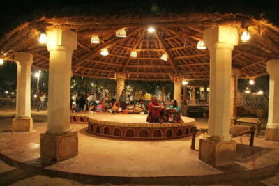 Jaipur: Cultural Evening Tour & Dinner at Chokhi Dhani - Rajasthani huts, crafts, and wandering time